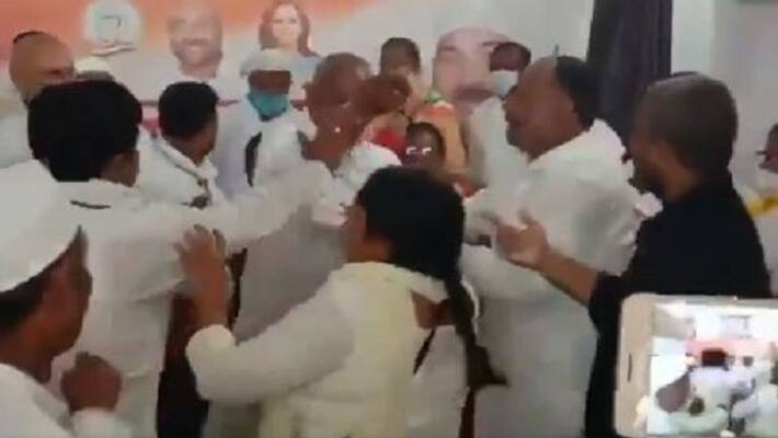 Congress woman leader beaten by party leaders in Uttar Pradesh rbj Congress woman leader beaten by party leaders in Uttar Pradesh rbj