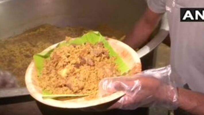 Karnataka put foot new normal people queue up at an eatery to buy biryani bsm Karnataka put foot new normal people queue up at an eatery to buy biryani bsm