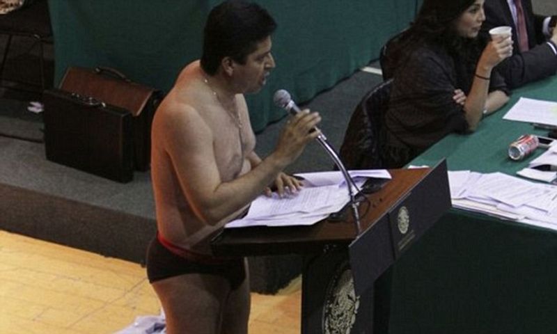 Mexican Congressman Antonio Garcia Conejo strips to protest energy privatisation bill dpl