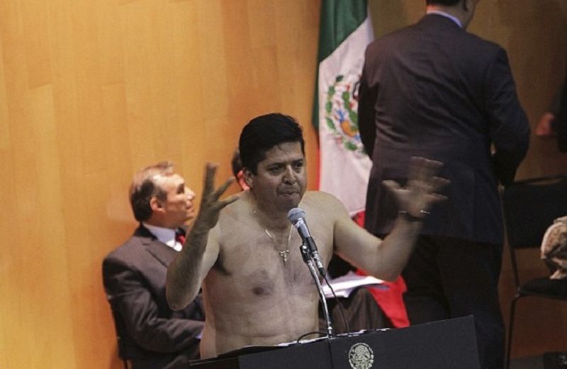 Mexican Congressman Antonio Garcia Conejo strips to protest energy privatisation bill dpl