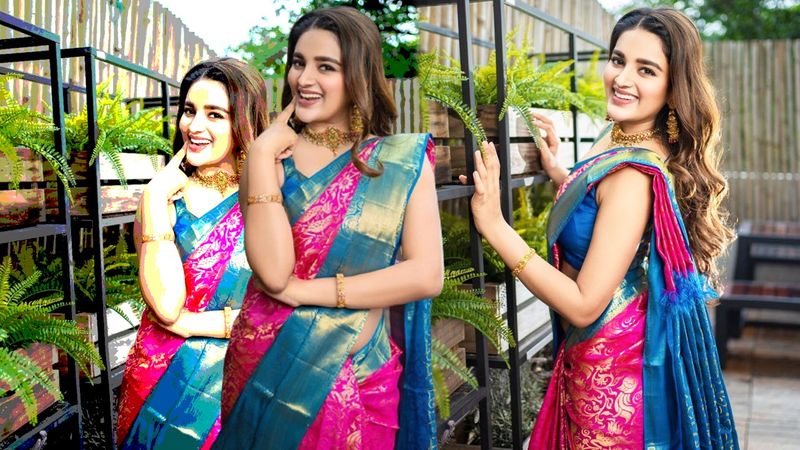 naughty poses of nidhi agarwal in saree latest photos goes viral ksr