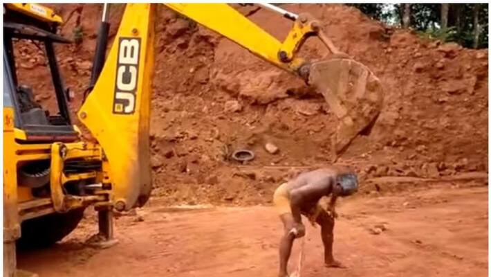 Man uses JCB excavator to scratch his back viral video Man uses JCB excavator to scratch his back viral video