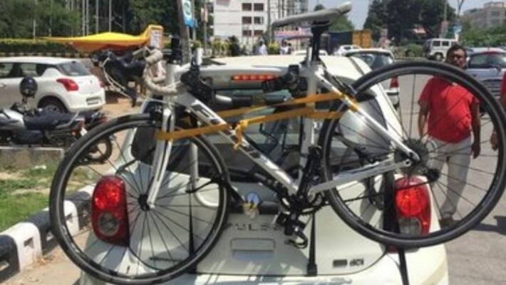 Carrying a cycle on a rack on car without proper RTO permissions might invite fines ckm Carrying a cycle on a rack on car without proper RTO permissions might invite fines ckm