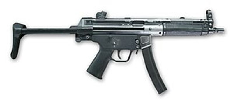 Manoj Abraham ips checking new MP5 rifle bought for the Kerala Police