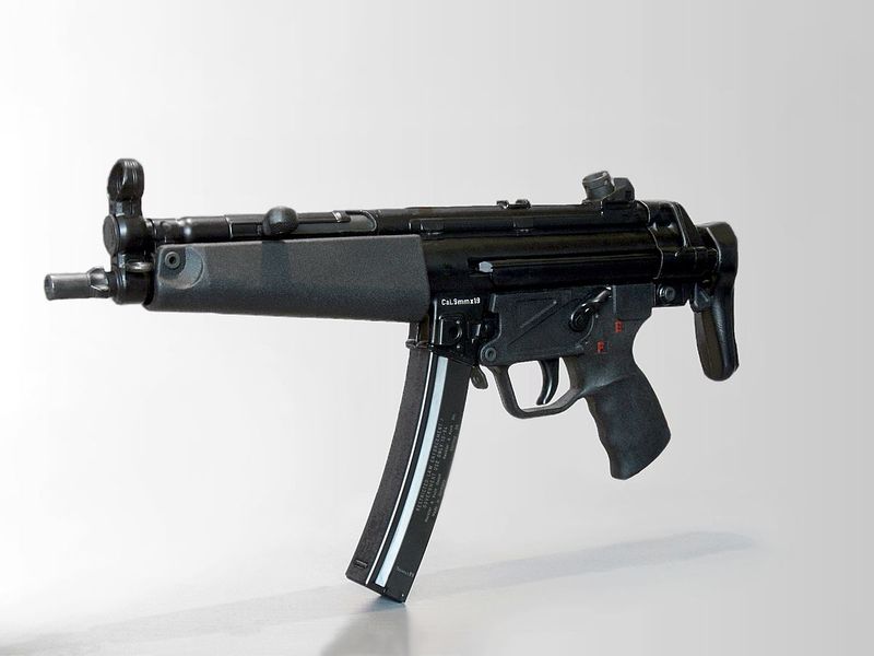Manoj Abraham ips checking new MP5 rifle bought for the Kerala Police