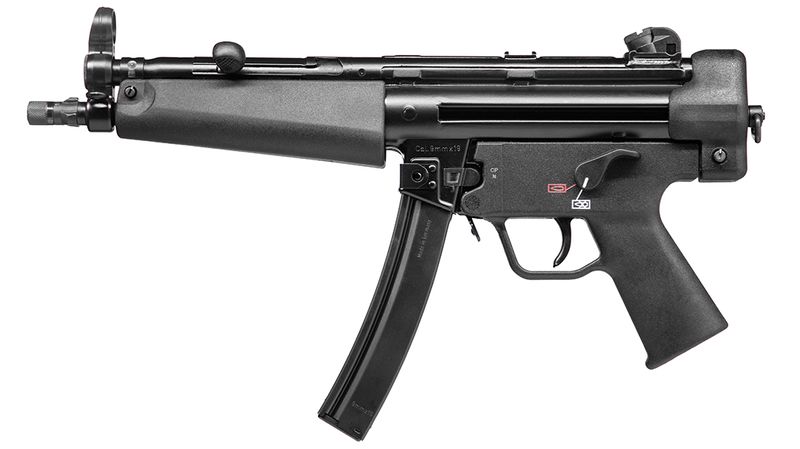 Manoj Abraham ips checking new MP5 rifle bought for the Kerala Police