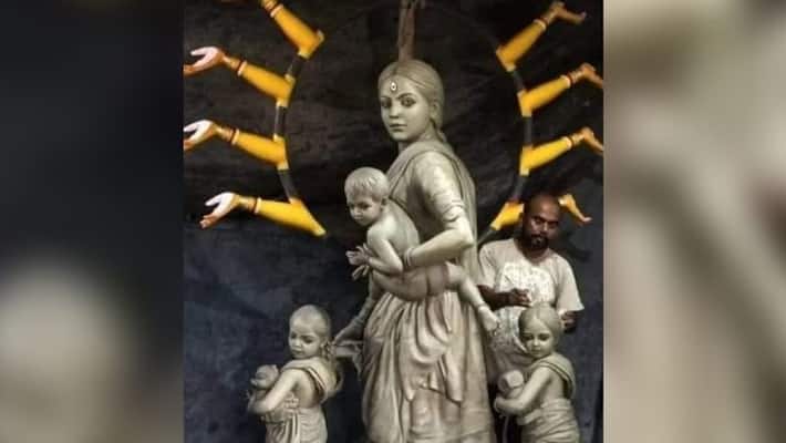 Behala Barisha club has pay homage to migrant worker in Durga Puja 2020 RTB Behala Barisha club has pay homage to migrant worker in Durga Puja 2020 RTB