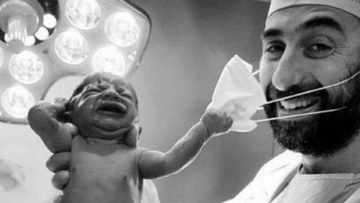 newborn removing Dubai doctors mask goes viral on social media newborn removing Dubai doctors mask goes viral on social media