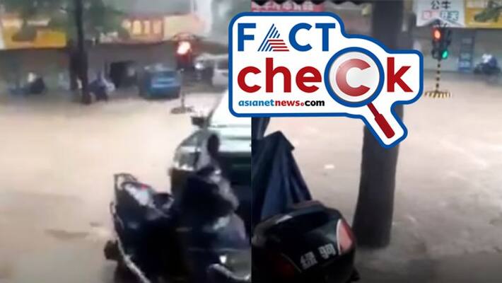 Viral clip traffic signal floating in flood not from Hyderabad Viral clip traffic signal floating in flood not from Hyderabad