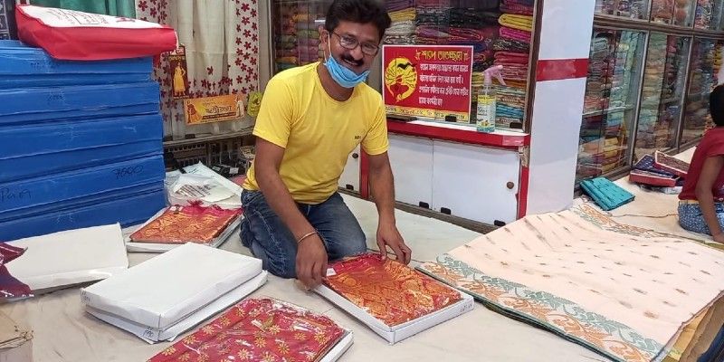 A garment shop offers special discount for Covid warriors during Dura Puja BTG