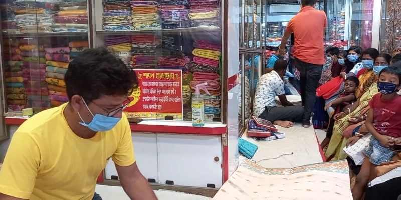 A garment shop offers special discount for Covid warriors during Dura Puja BTG