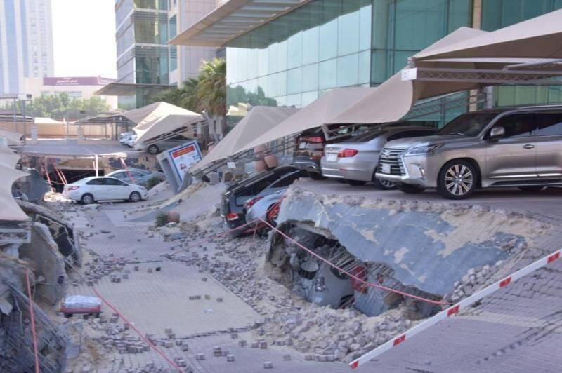 car parking building collapsed and four injured in saudi