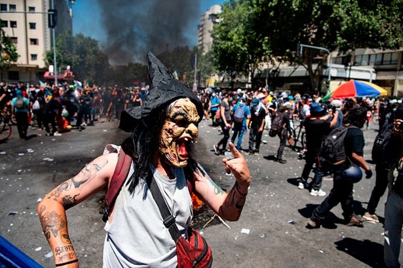 chilean protesters burn two churches photo story