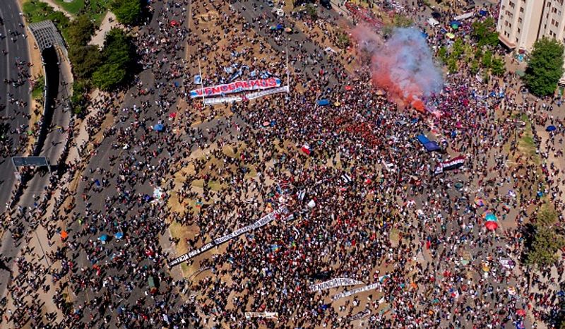 chilean protesters burn two churches photo story