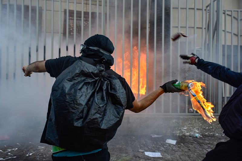 chilean protesters burn two churches photo story