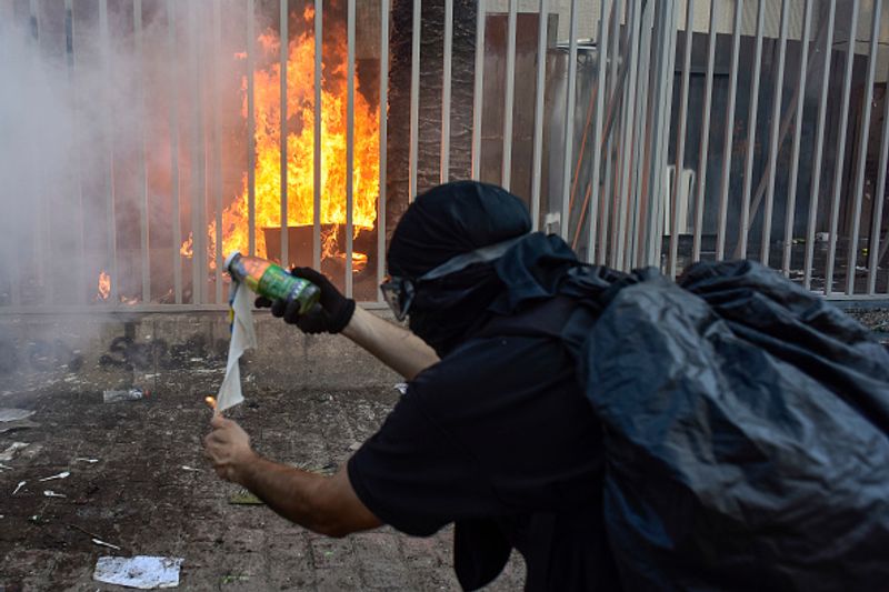 chilean protesters burn two churches photo story