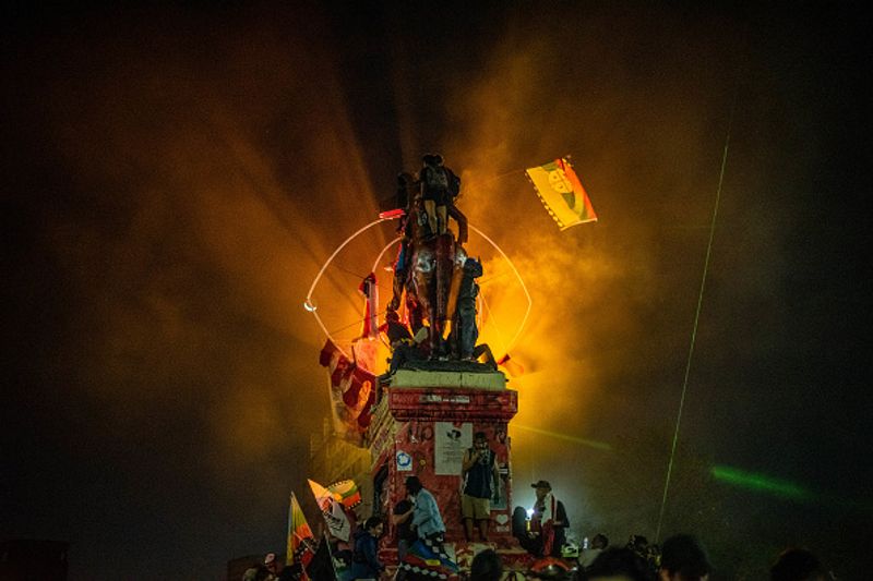 chilean protesters burn two churches photo story