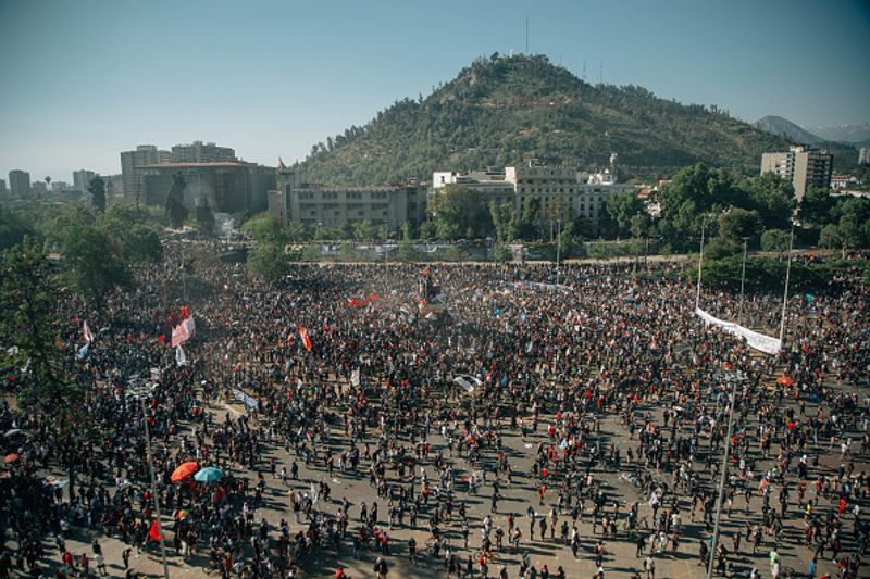 chilean protesters burn two churches photo story