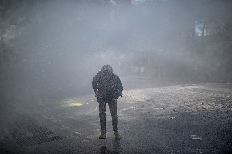 chilean protesters burn two churches photo story