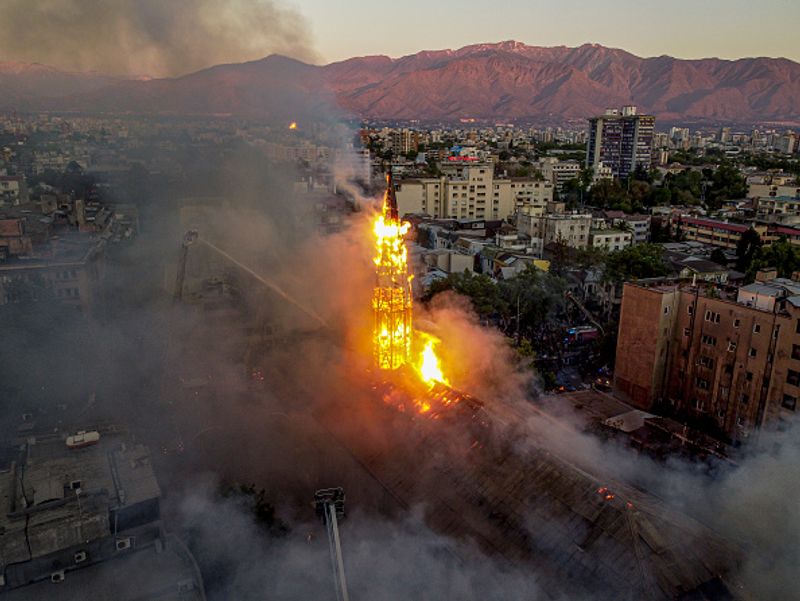 chilean protesters burn two churches photo story