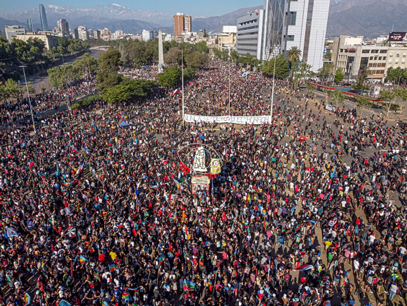 chilean protesters burn two churches photo story