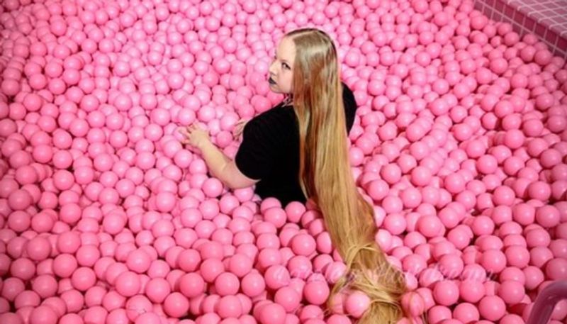 woman with long hair gets huge attention in social media