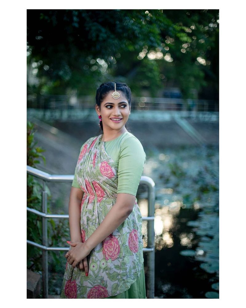 Bigg boss fame Losliya Latest green dress photo shoot