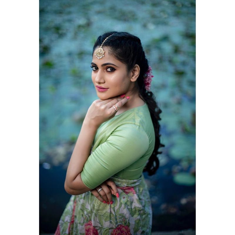 Bigg boss fame Losliya Latest green dress photo shoot