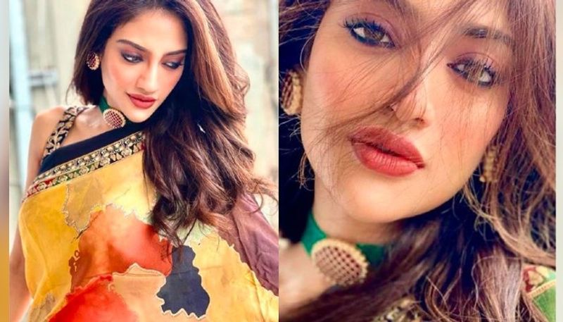 Nusrat Jahan looks breathtakingly beautiful in her embroidered chiffon saree ADB