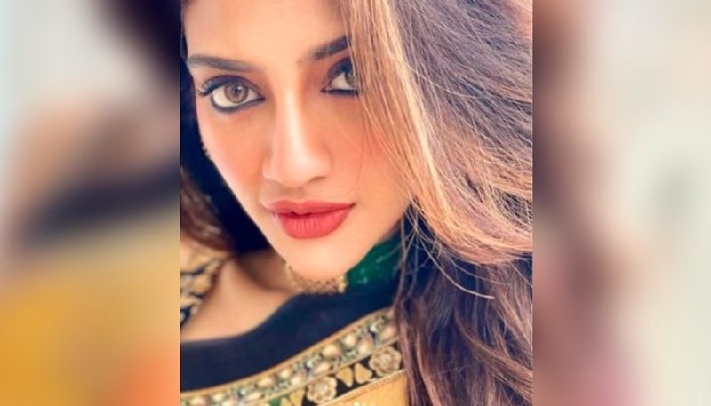 Nusrat Jahan looks breathtakingly beautiful in her embroidered chiffon saree ADB