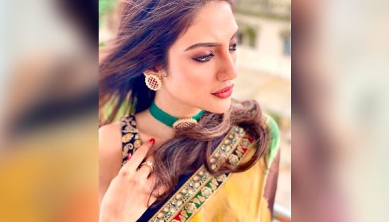 Nusrat Jahan looks breathtakingly beautiful in her embroidered chiffon saree ADB