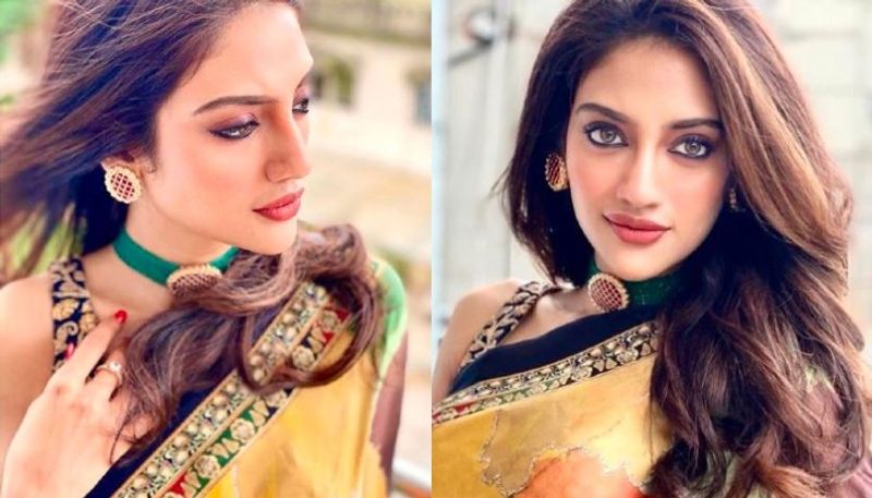 Nusrat Jahan looks breathtakingly beautiful in her embroidered chiffon saree ADB