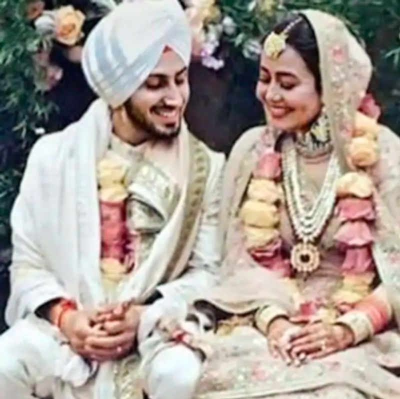 Neha Kakkar and Rohanpreet Singhs wedding look will remind you of Virushka dpl
