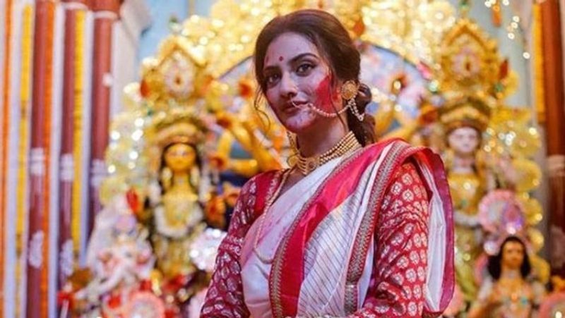 Trinamool Congress MP Nusrat Jahan seen immersed in Durga Puja