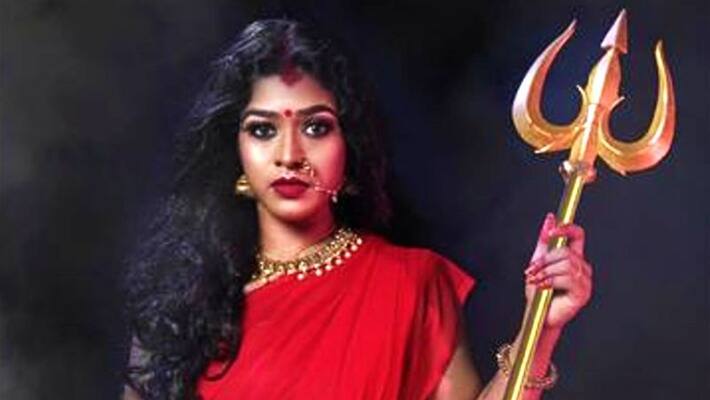 Hindu Goddess shown drinking and smoking up by Kerala photographer ALB Hindu Goddess shown drinking and smoking up by Kerala photographer ALB