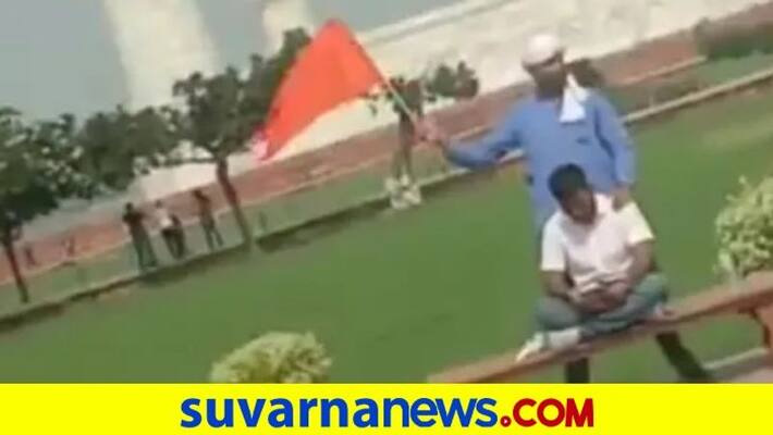 Hindu Jagran Manch leaders sprinkle ganga jal hoist saffron flag in Taj Mahal pod Hindu Jagran Manch leaders sprinkle ganga jal hoist saffron flag in Taj Mahal pod