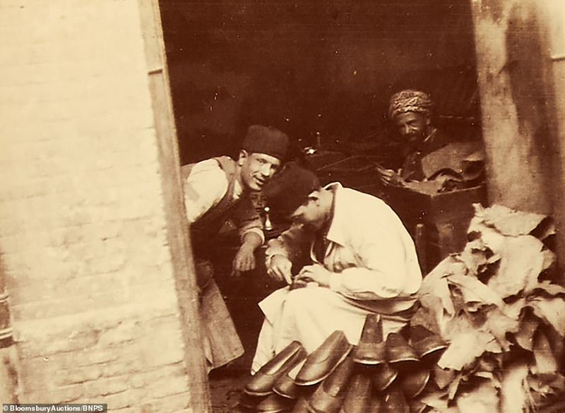 112 year old family album contains photos and postcards
