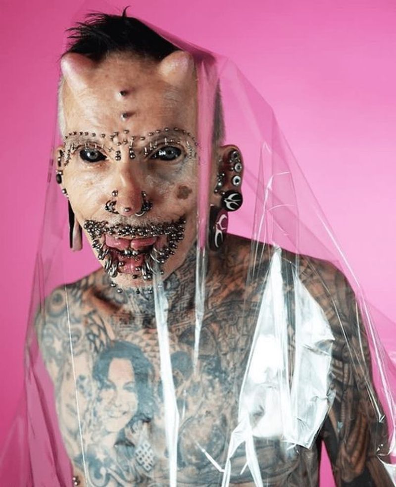 German Man Sets Record for Most Number of Body Modifications Including Two Horns and 453 Piercings