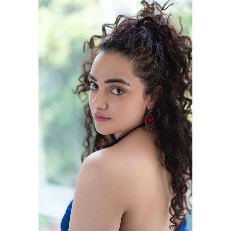 nitya menon asks fans how is her new hair ksr