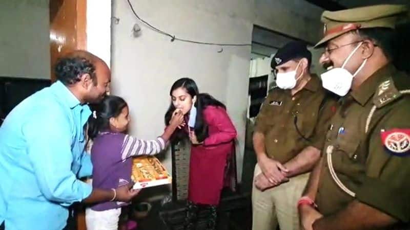 Uttar Pradesh Police celebrate Diwali with a firecracker seller and his family ALB