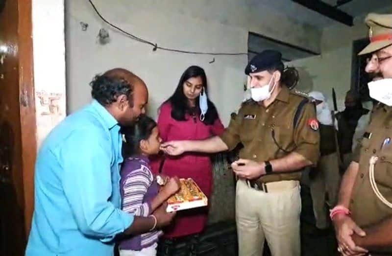 Uttar Pradesh Police celebrate Diwali with a firecracker seller and his family ALB