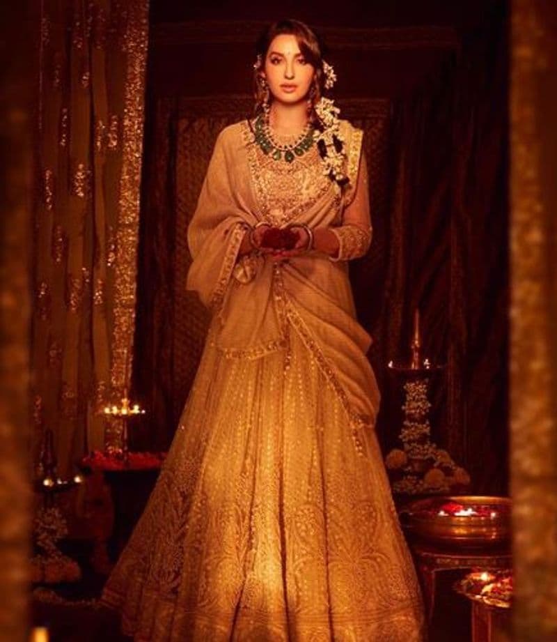 Nora Fatehi in regal gold lehenga choli will take your breath away