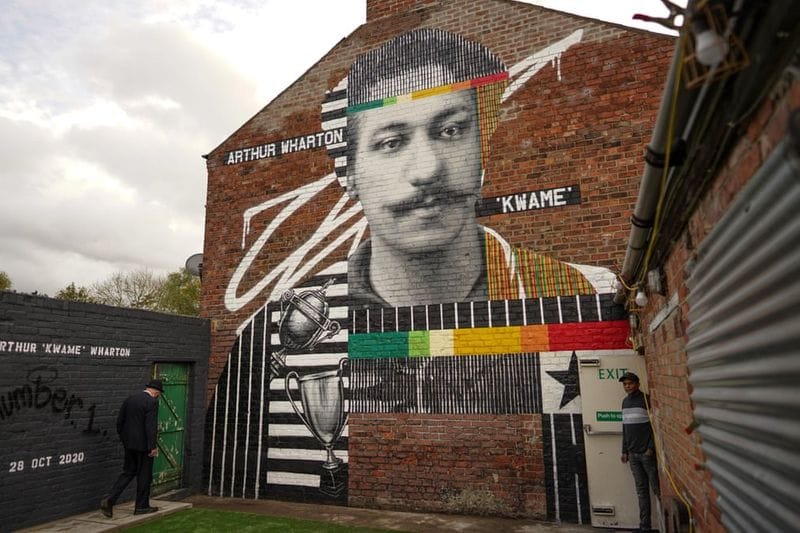 football players mural painting in world cities