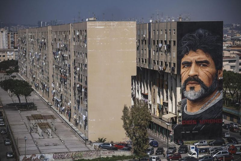 football players mural painting in world cities