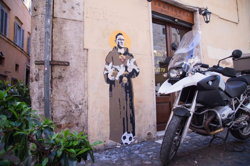 football players mural painting in world cities