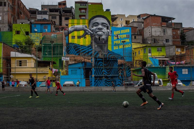 football players mural painting in world cities