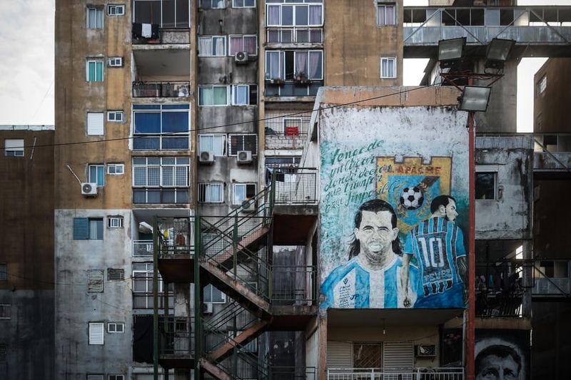 football players mural painting in world cities