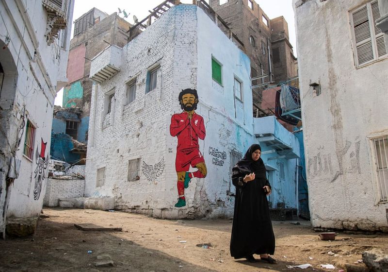football players mural painting in world cities