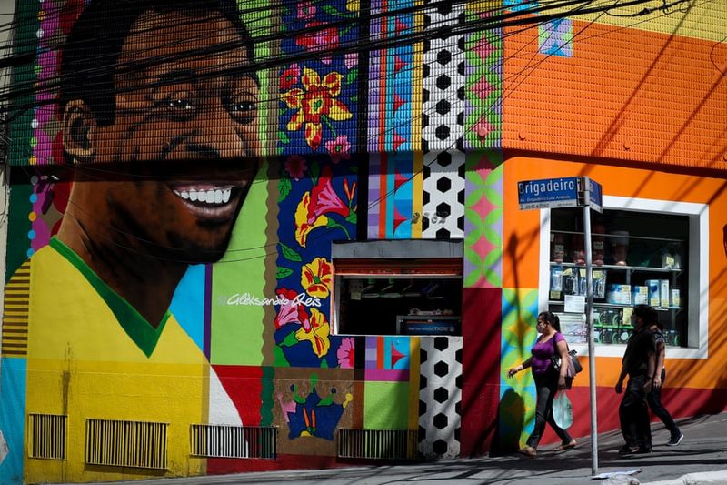 football players mural painting in world cities