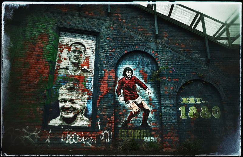 football players mural painting in world cities